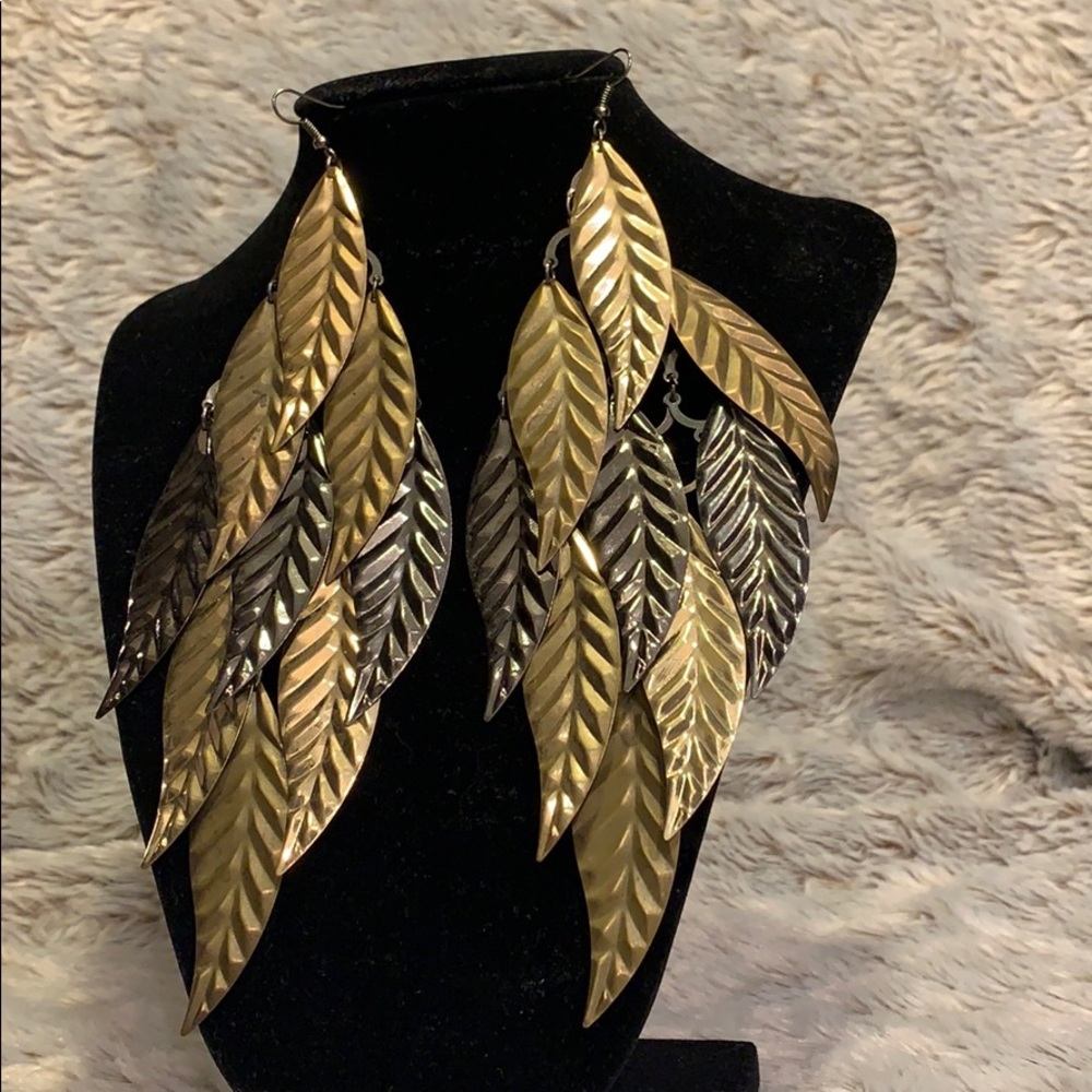 Statement earrings. Gold, platinum color.
